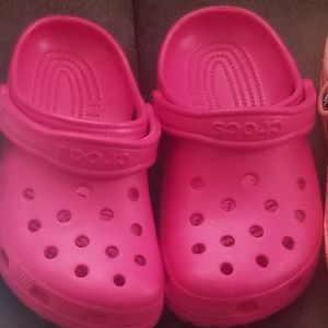 Magenta Crocs size 5